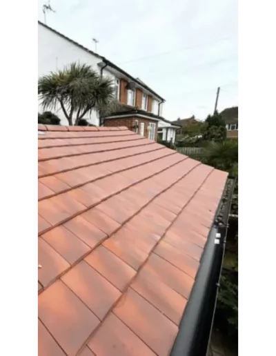 Newly tiled roof of a suburban house.