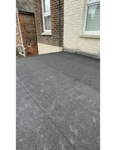 Flat roof with black felt covering
